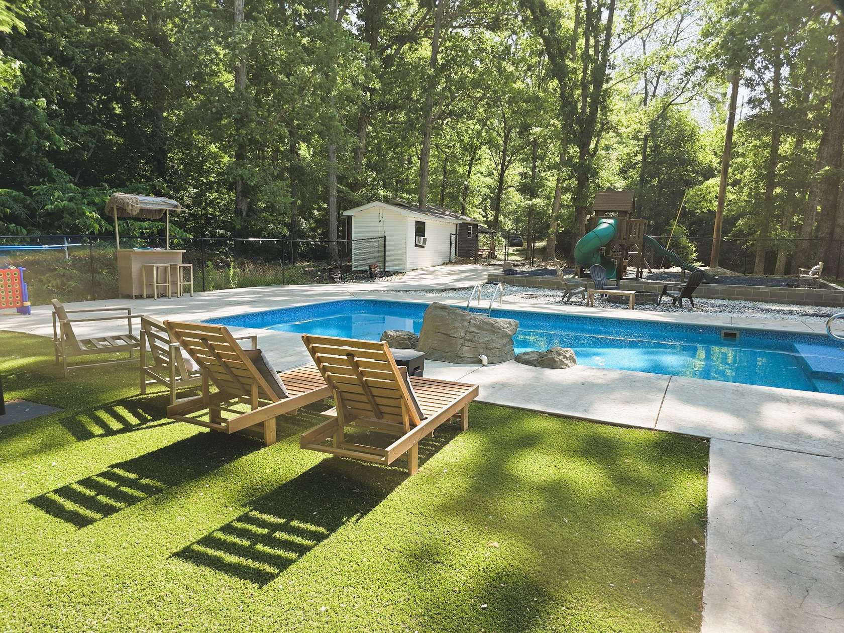 8.73 Acres of Land with Home for Sale in Holladay, Tennessee