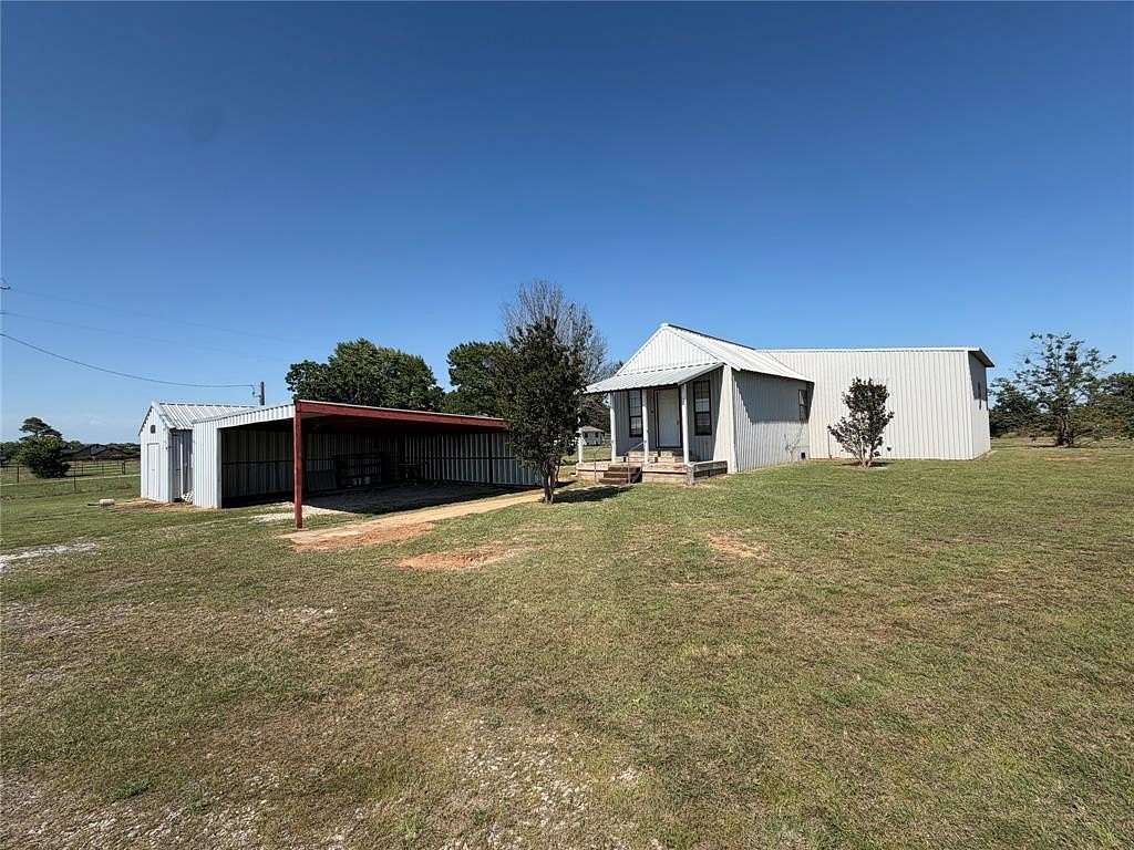 2.73 Acres of Land with Home for Sale in Millsap, Texas