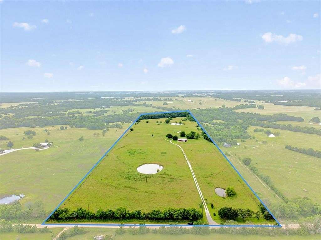 33 Acres of Land with Home for Sale in Wolfe City, Texas