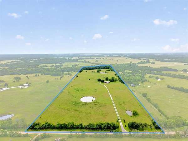 33 Acres of Land with Home for Sale in Wolfe City, Texas