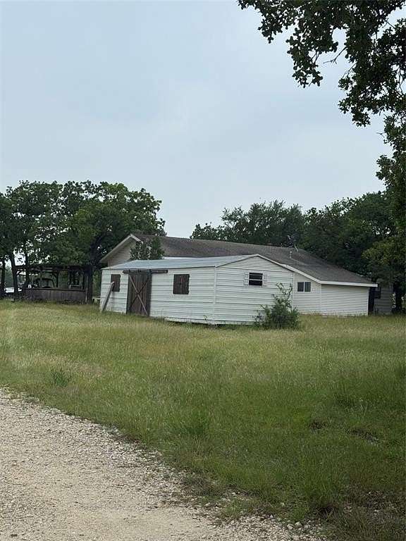 64.7 Acres of Agricultural Land with Home for Sale in Bluff Dale, Texas
