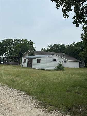 64.7 Acres of Agricultural Land with Home for Sale in Bluff Dale, Texas
