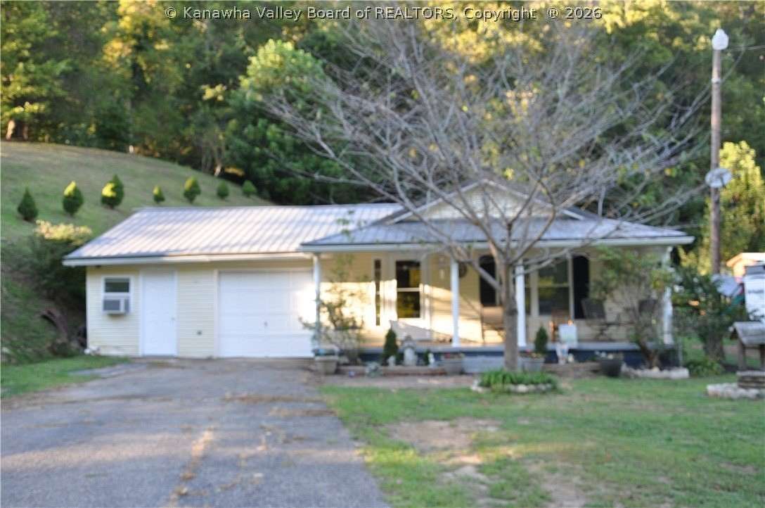 1.5 Acres of Land with Home for Sale in Julian, West Virginia