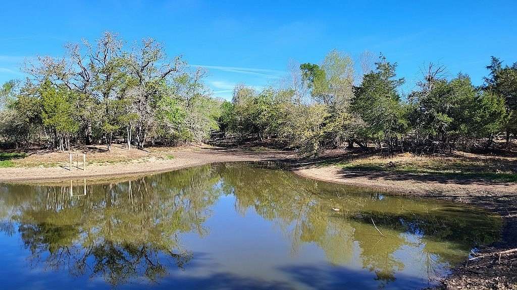 7.29 Acres of Land with Home for Sale in Paige, Texas