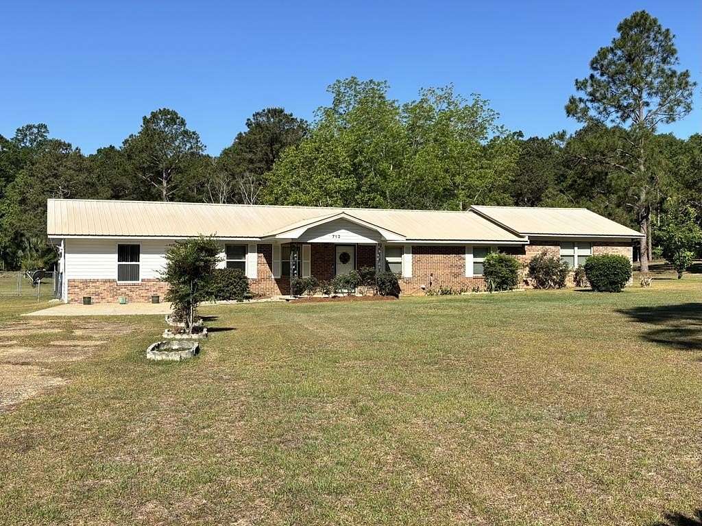 6.68 Acres of Land with Home for Sale in Cowarts, Alabama