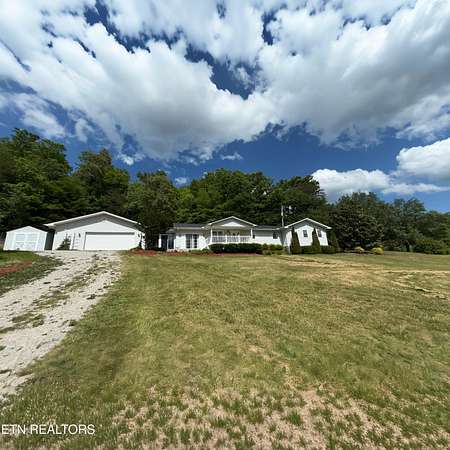 7 Acres of Land with Home for Sale in Pioneer, Tennessee