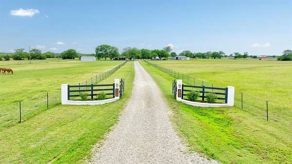 31.2 Acres of Agricultural Land with Home for Sale in Whitewright, Texas