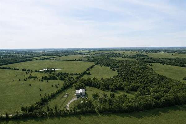 30.4 Acres of Recreational Land with Home for Sale in Dodd City, Texas