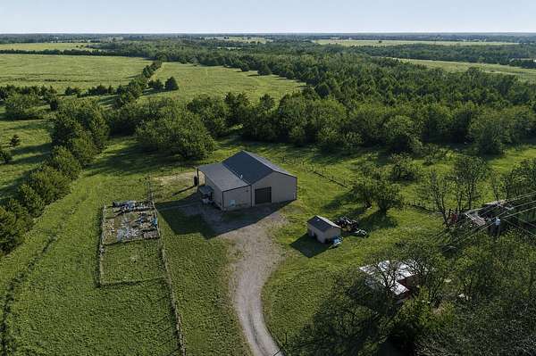 30.4 Acres of Recreational Land with Home for Sale in Dodd City, Texas