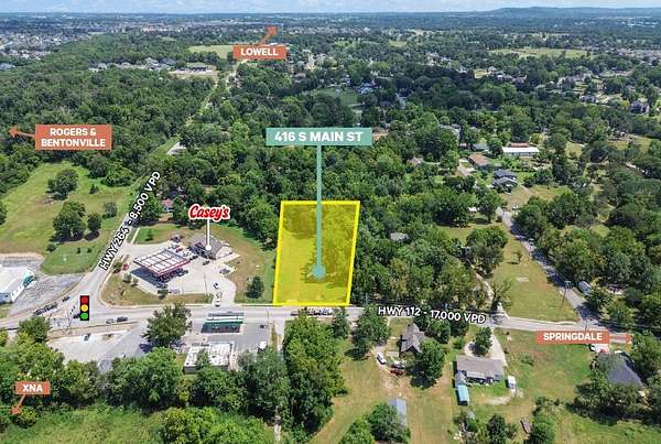 0.6 Acres of Commercial Land for Sale in Cave Springs, Arkansas