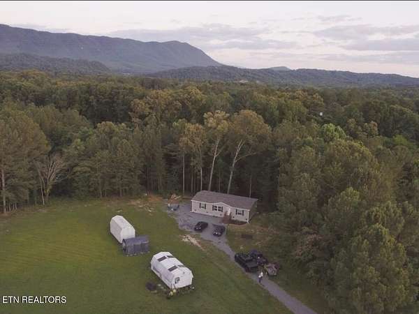 5 Acres of Land with Home for Sale in Benton, Tennessee