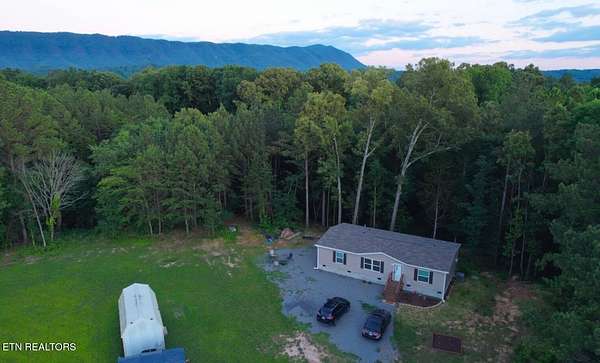 5 Acres of Land with Home for Sale in Benton, Tennessee