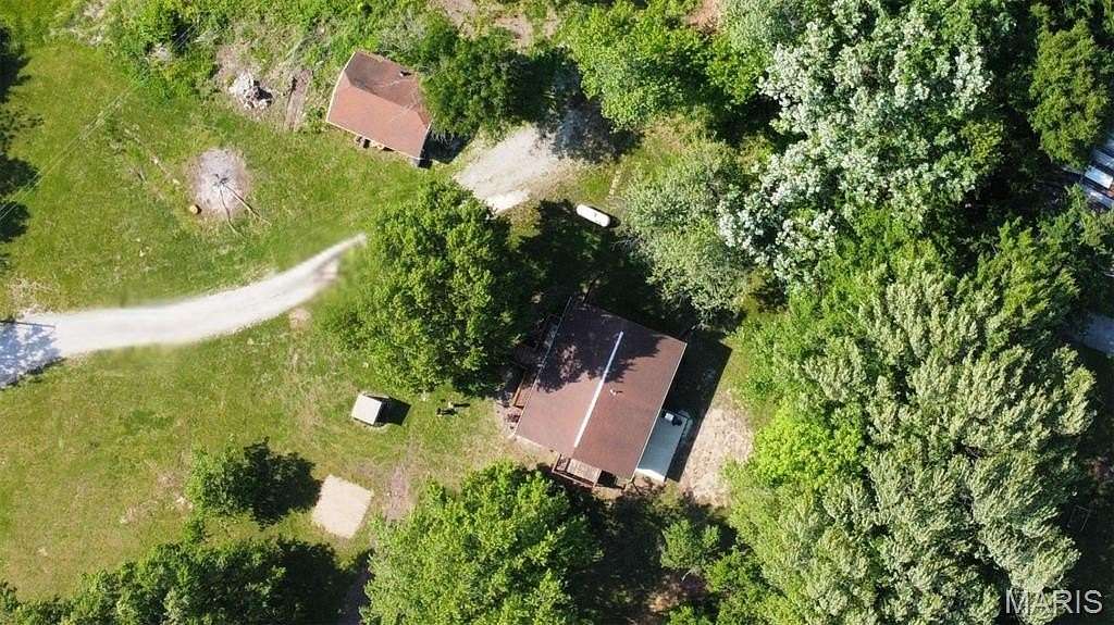 1.69 Acres of Land with Home for Sale in Mount Olive, Illinois