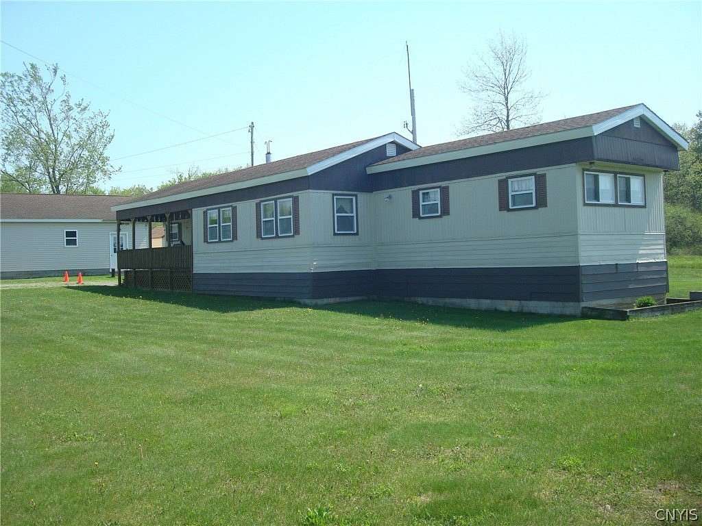 1.5 Acres of Land with Home for Sale in Clayton, New York