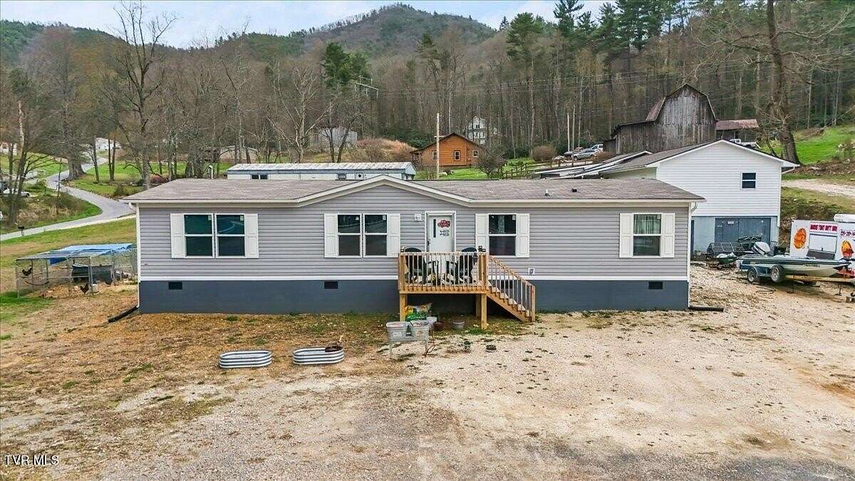1.67 Acres of Land with Home for Sale in Hampton, Tennessee
