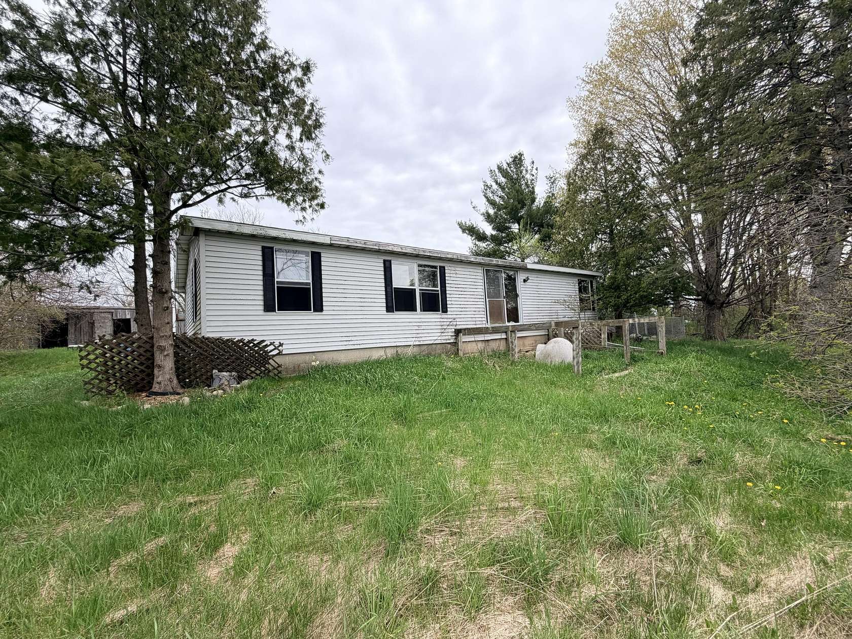 3 Acres of Land with Home for Sale in Custer, Michigan