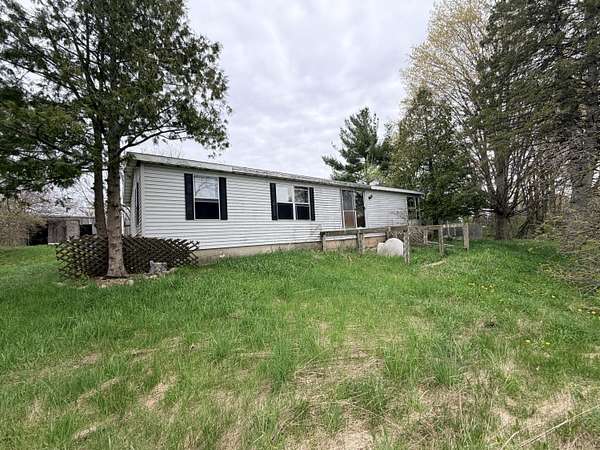 3 Acres of Land with Home for Sale in Custer, Michigan
