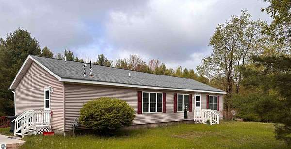 10 Acres of Land with Home for Sale in Interlochen, Michigan