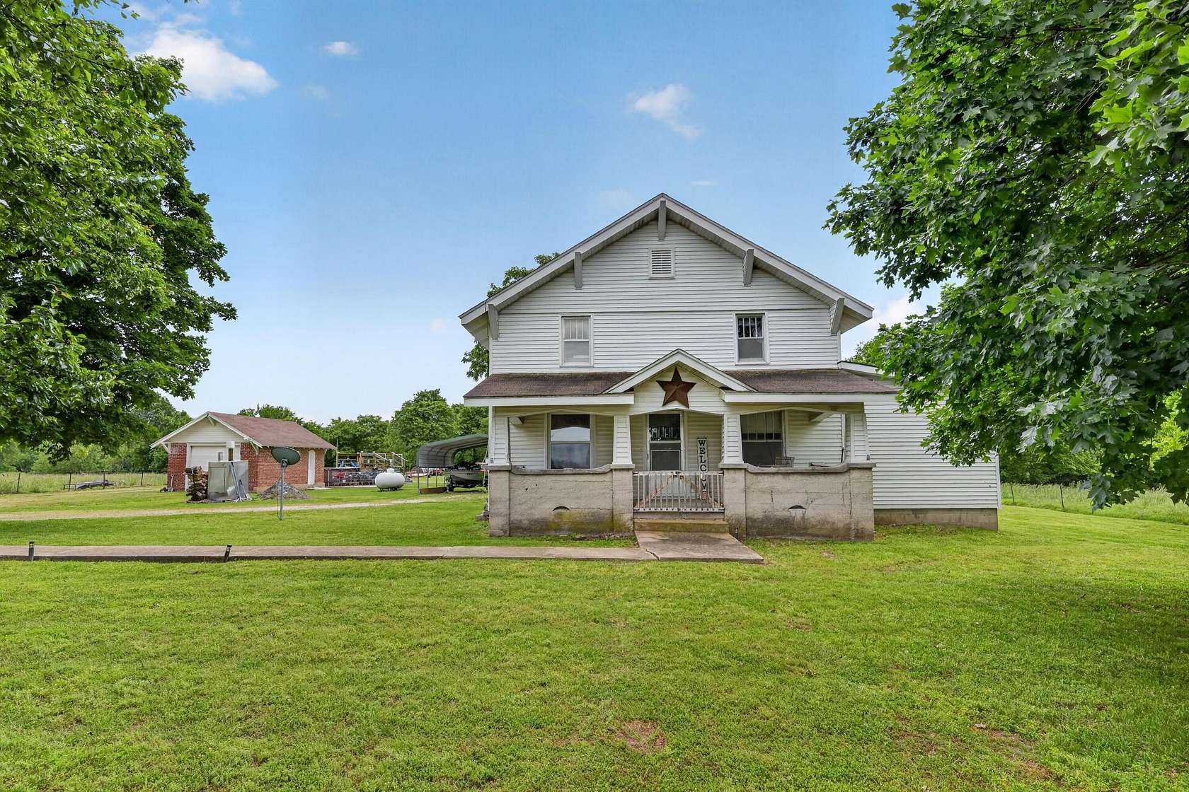 10 Acres of Land with Home for Sale in Sarcoxie, Missouri