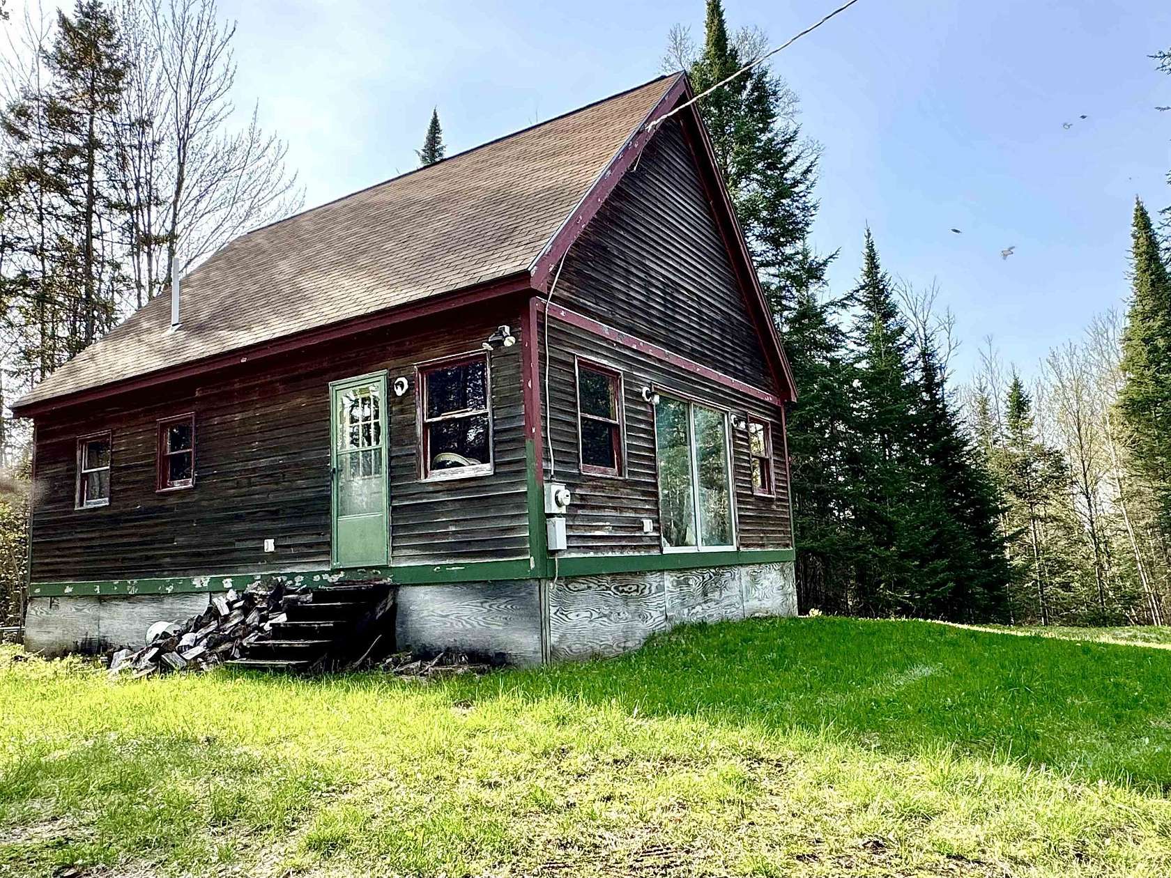 5 Acres of Land with Home for Sale in Stewartstown, New Hampshire