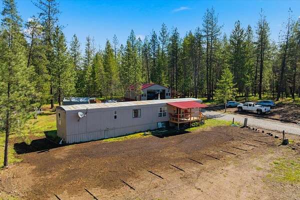 5 Acres of Land with Home for Sale in Loon Lake, Washington