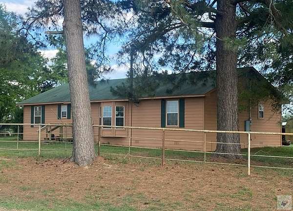 7 Acres of Land with Home for Sale in De Kalb, Texas