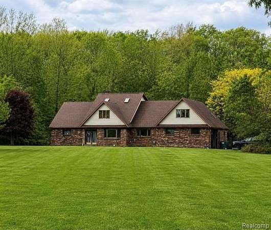 4 Acres of Land with Home for Sale in Caledonia Township, Michigan