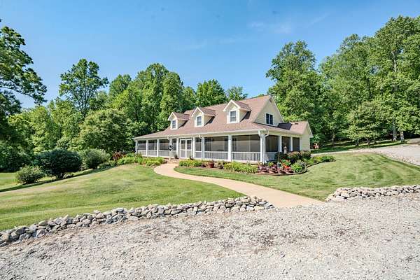 394 Acres of Land with Home for Sale in Lutts, Tennessee