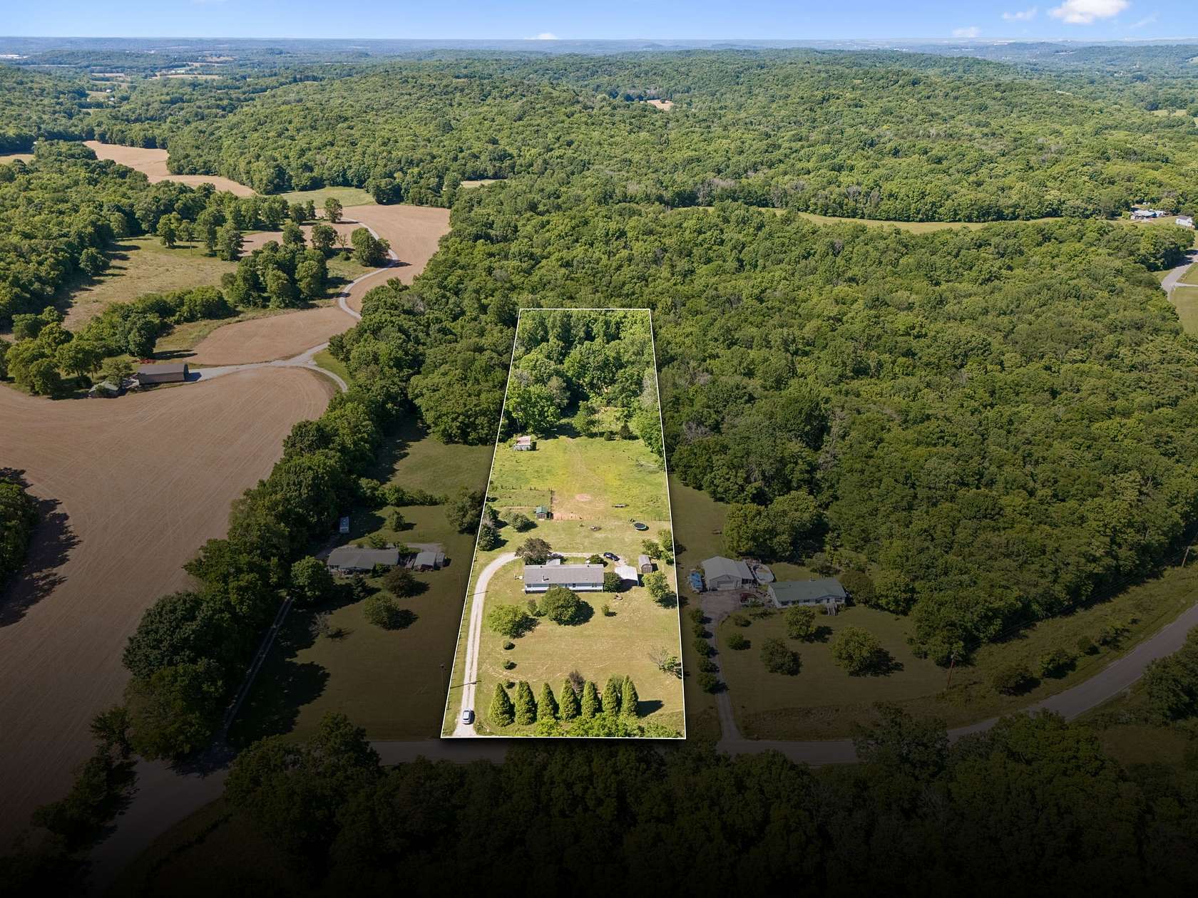 5.1 Acres of Land with Home for Sale in Columbia, Tennessee