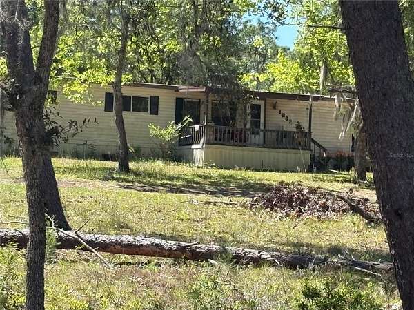 5.16 Acres of Land with Home for Sale in Florahome, Florida