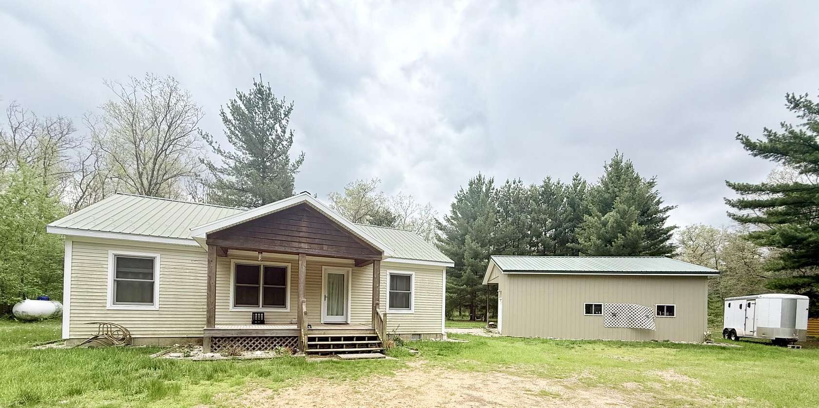 1.5 Acres of Land with Home for Sale in Bitely, Michigan