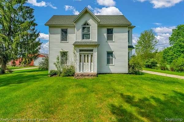 9.87 Acres of Land with Home for Sale in Clyde Township, Michigan