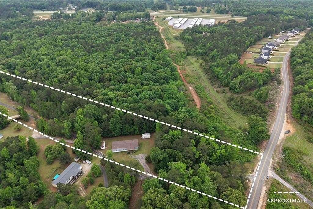 3 Acres of Land with Home for Sale in Opelika, Alabama