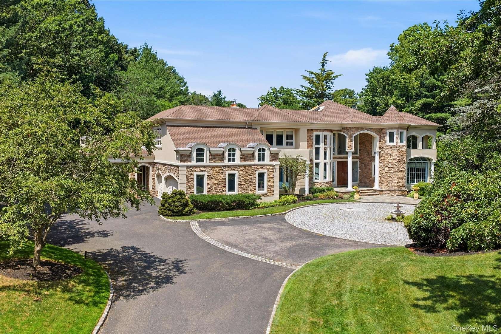 2.23 Acres of Land with Home for Sale in Oyster Bay Cove, New York