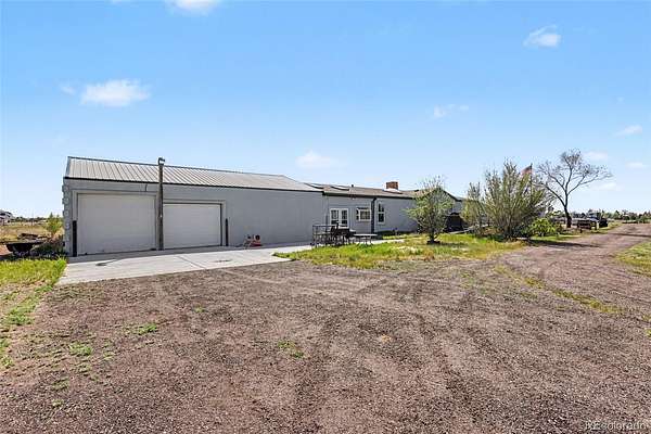 5.75 Acres of Land with Home for Sale in Peyton, Colorado