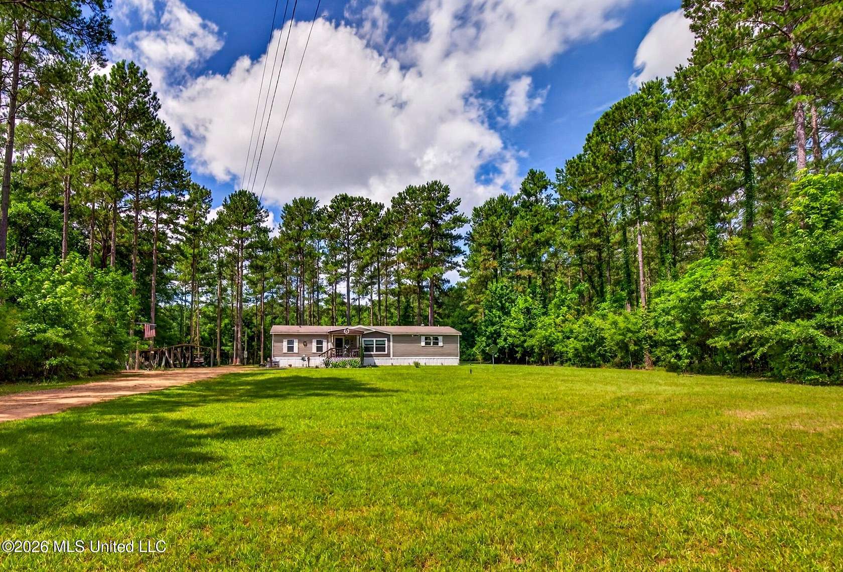 13.5 Acres of Recreational Land with Home for Sale in Columbia, Mississippi