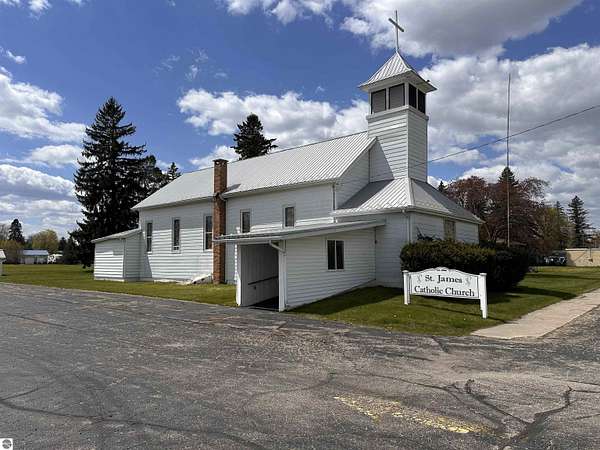 11.5 Acres of Improved Commercial Land for Sale in Whittemore, Michigan