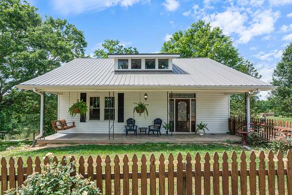 17.7 Acres of Land with Home for Sale in Charlotte, Tennessee
