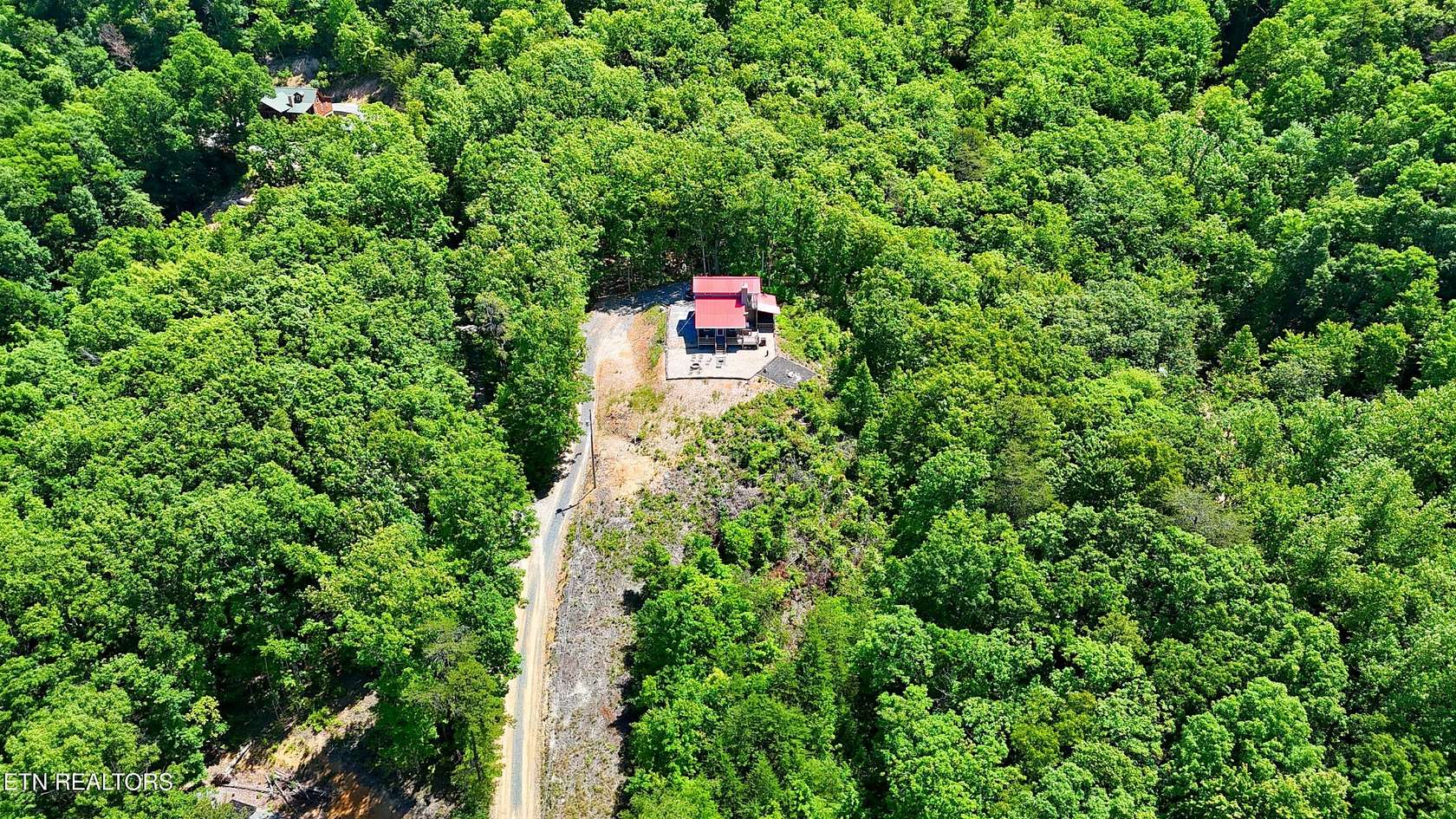 7.83 Acres of Land with Home for Sale in Del Rio, Tennessee