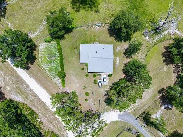 6.72 Acres of Land with Home for Sale in Lake City, Florida