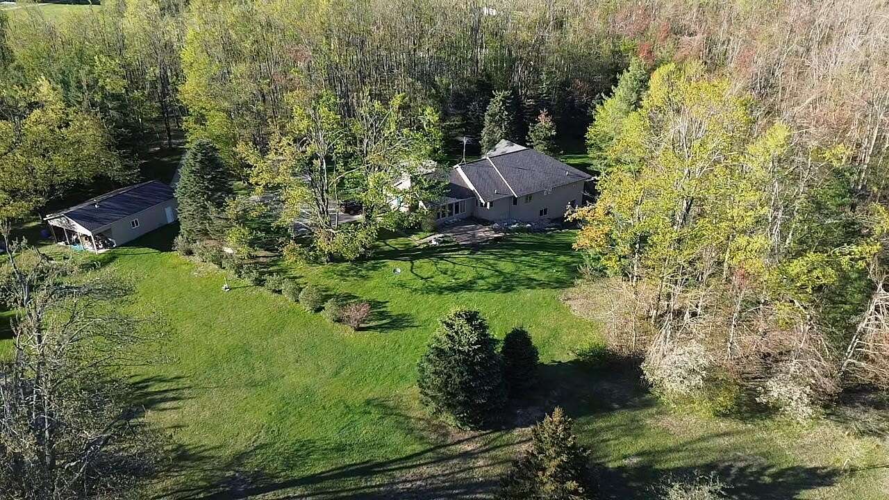 118 Acres of Recreational Land with Home for Sale in Gaylord, Michigan