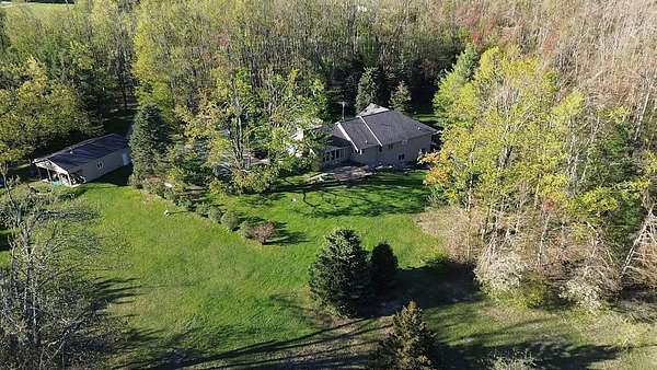 118 Acres of Recreational Land with Home for Sale in Gaylord, Michigan