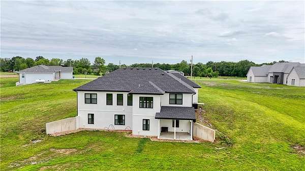 7.48 Acres of Land with Home for Sale in Warrensburg, Missouri