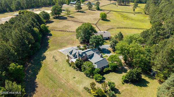 11.3 Acres of Land with Home for Sale in Vass, North Carolina