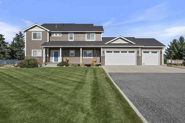 5 Acres of Land with Home for Sale in Otis Orchards, Washington