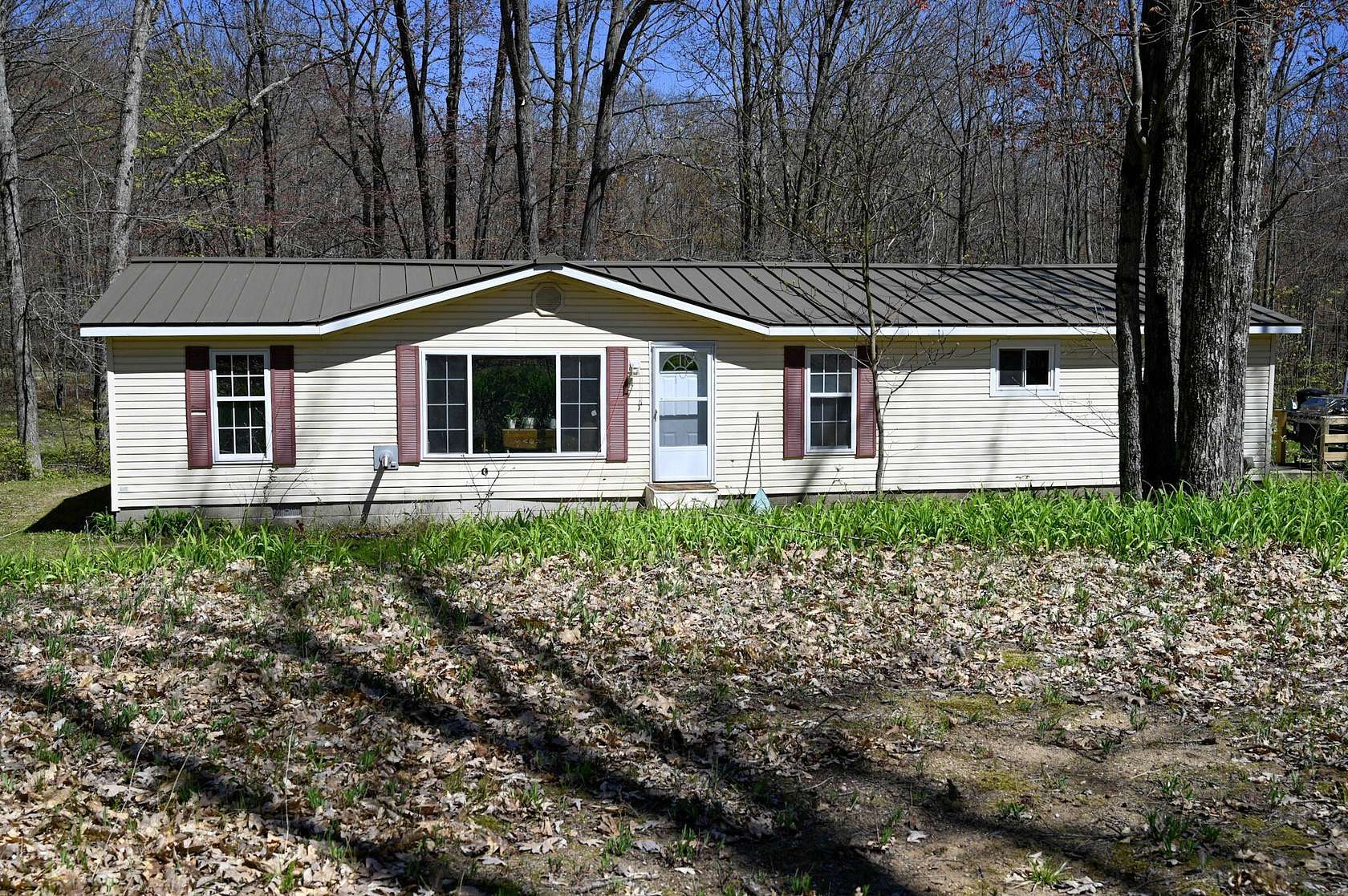 2 Acres of Land with Home for Sale in Evart, Michigan