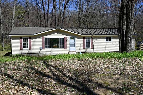 2 Acres of Land with Home for Sale in Evart, Michigan