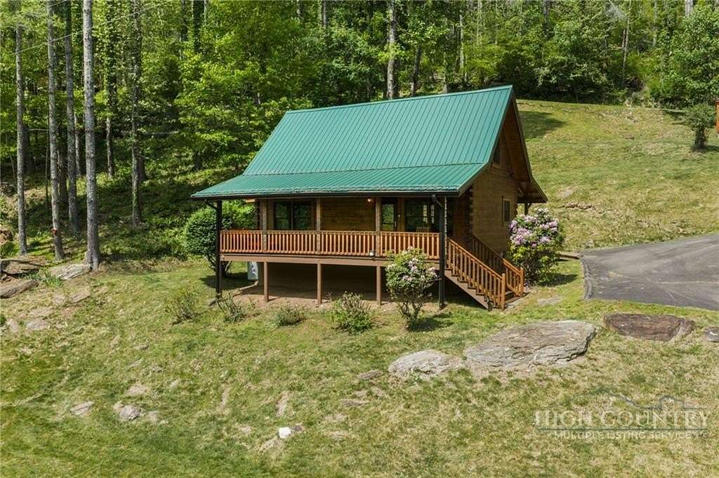 3.59 Acres of Land with Home for Sale in Lansing, North Carolina
