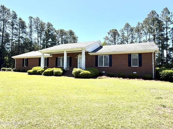 6.76 Acres of Land with Home for Sale in Faison, North Carolina