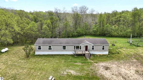 5 Acres of Land with Home for Sale in Reed City, Michigan